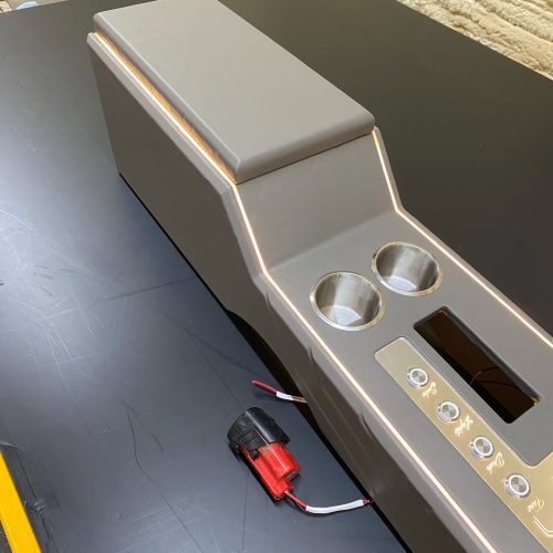 Front to back bucket seats console